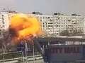 Moment Russian rocket flies past Ukrainian shopping mall and explodes into flats eiqrkitriqrdinv
