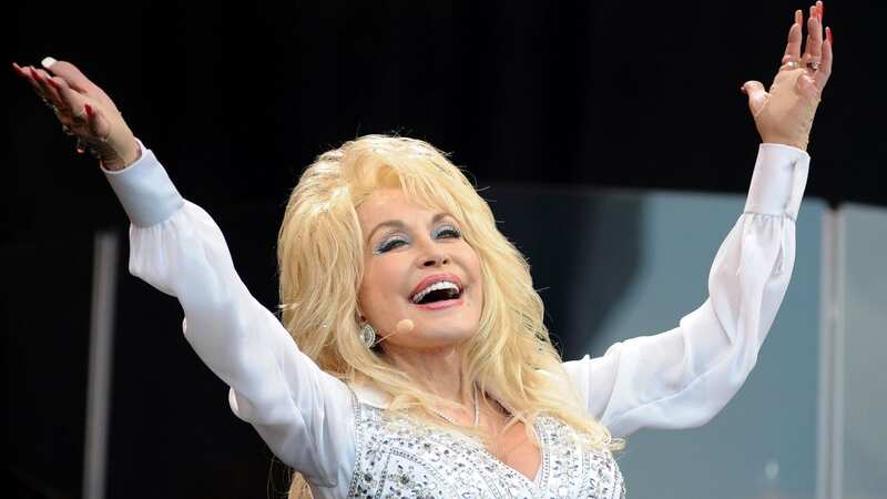 An MP has called for a debate on one of Dolly Parton