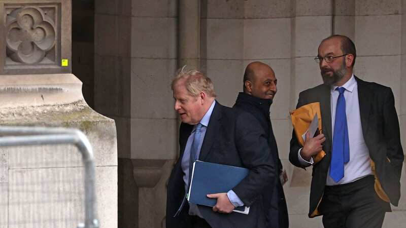 Boris Johnson on his way to the grilling (Image: AFP via Getty Images)