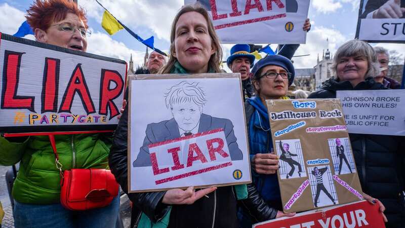 Protests outside Parliament as Boris Johnson gives evidence (Image: amer ghazzal/REX/Shutterstock)