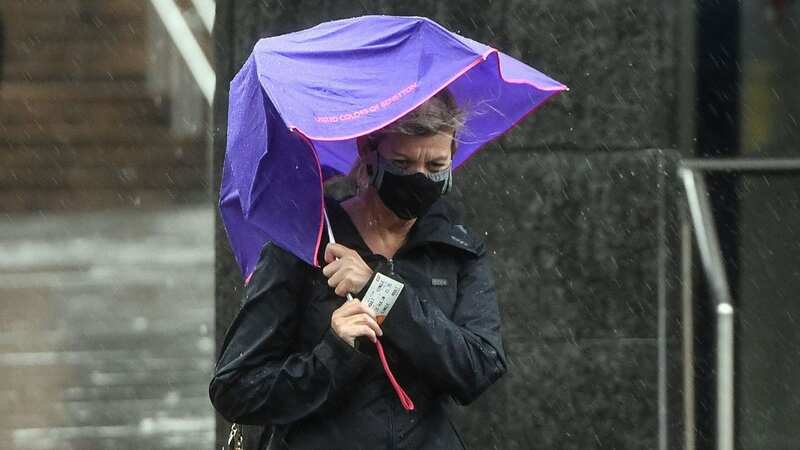 Strong winds and rain will continue to hit Britain this week (Image: AFP via Getty Images)