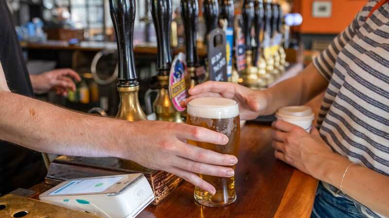 Bartenders have shared the best way to get their attention (Image: Bloomberg via Getty Images)