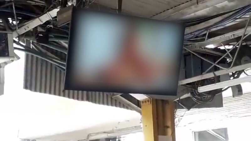 Commuters mortified as adult film is screened at train station platform