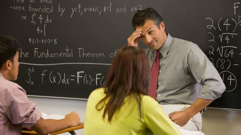 The students gifted the teacher a handmade book (stock photo) (Image: Getty Images/Blend Images)