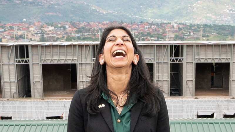 Suella Braverman tours a building site on the outskirts of Kigali during her visit to Rwanda (Image: PA)