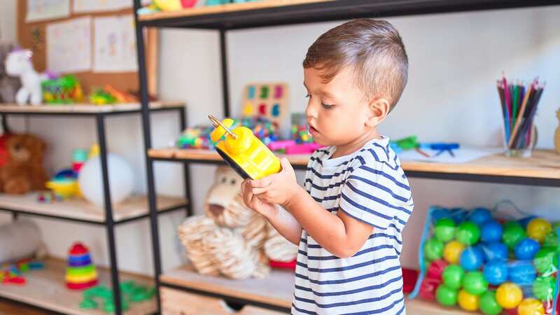 A quarter of parents are cutting back on necessities to pay for childcare. (Image: Getty Images/iStockphoto)