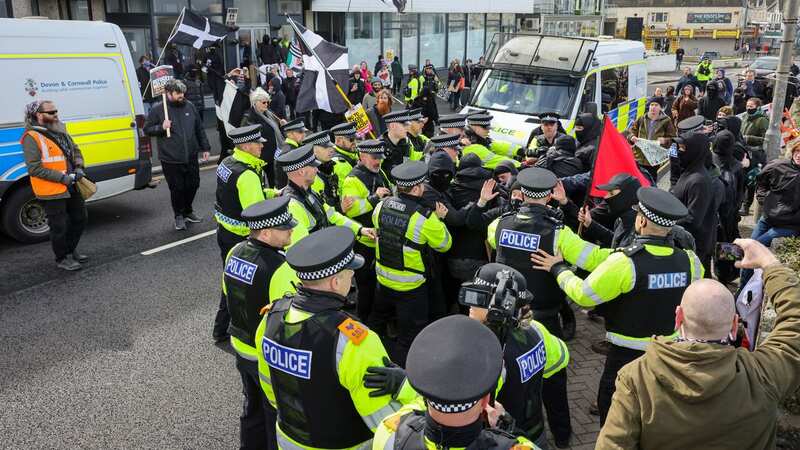 Violence breaks out outside asylum seeker hotel as protestors clash with police