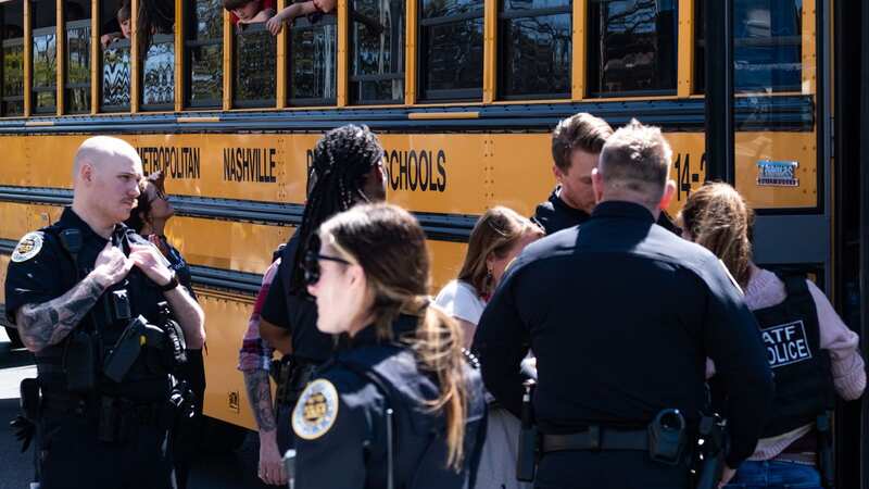 School buses with children arrive at Woodmont Baptist Church to be reunited with their families after a mass shooting at The Covenant School (Image: Getty Images)