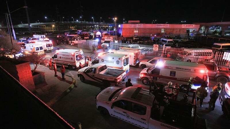 Huge fire kills 39 people and injures dozens as firefighters rush to scene