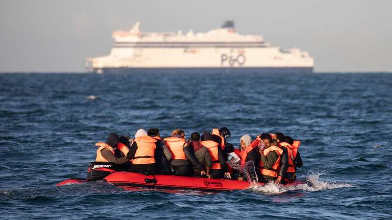 Asylum seekers packed onto a small inflatable boat as they attempt to cross the English Channel in 2020 (Image: Getty Images)