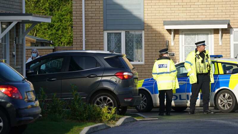 Police outside one of the properties in Bluntisham, Cambridgeshire, this morning (Image: PA)