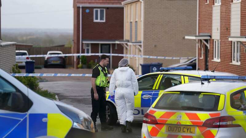Police and forensics at the scene in Meridian Close (Image: PA)