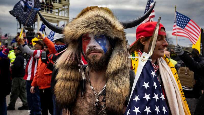 QAnon Shaman pleaded guilty to civil disorder and violent entry after storming Capitol Hill (Image: Getty Images)