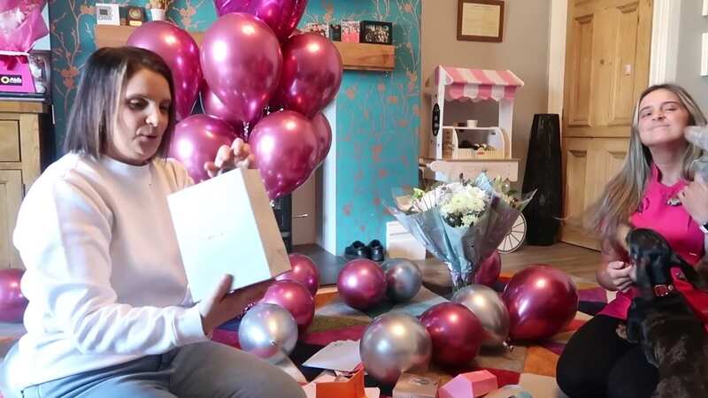 Footage showed Sue then opening her presents - including lots of flowers and chocolate and sweet handmade cards by the younger children (Image: The Radford Family/Youtube)