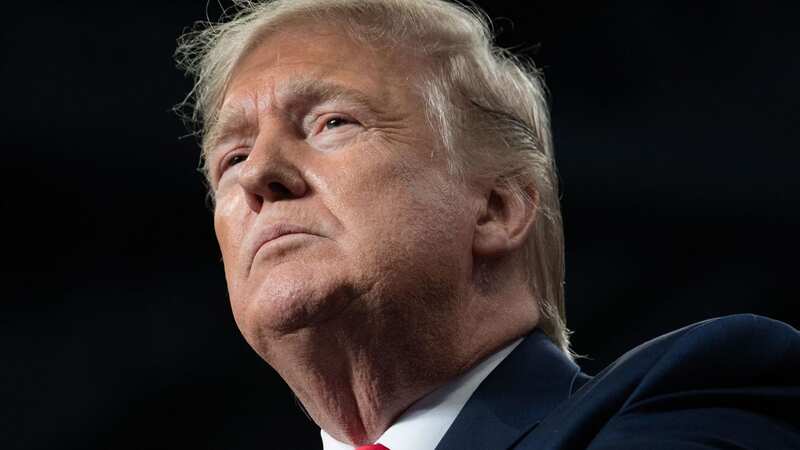 Donald Trump will appear before Manhattan DA Alvin Bragg on Tuesday (Image: AFP via Getty Images)