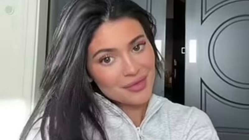 Kylie cuddled her adorable son Aire, who she rarely posts (Image: Instagram)