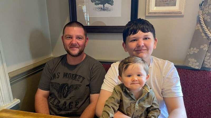 Brett Dymond with his two sons Reiss, 16, and Tommy, 2
