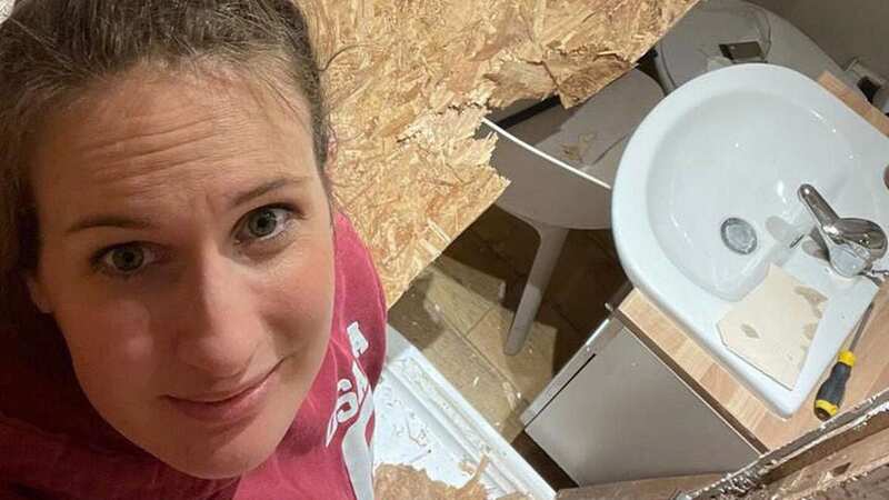 Woman baffled after finding hidden shower behind bathroom wall