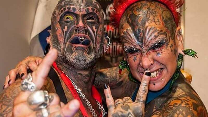 Couple with 91 piercings and tattoos say people think they