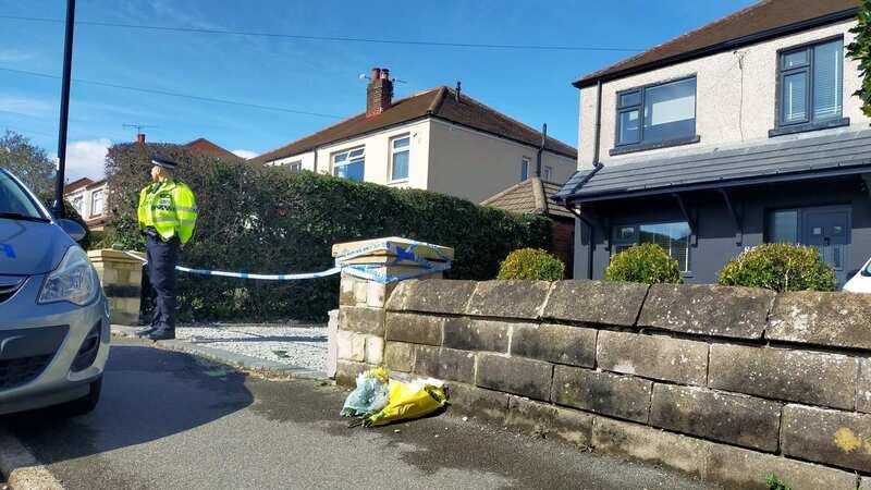 Tributes were left in Sheffield for a 60-year-old woman killed in a car crash last night (Image: Sheffield Star / SWNS)