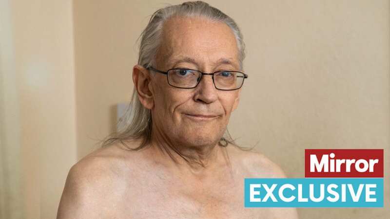 Mark Nock, a retired nurse who was diagnosed with breast cancer (Image: SWNS)