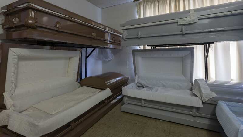 This image shows the empty caskets left at the abandoned funeral home (Image: mediadrumimages/LelandKent)