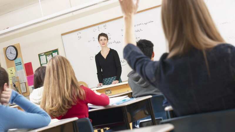 Teachers work an average of 54 hours a week, a new survey revealed (stock photo) (Image: Getty Images/Ingram Publishing)