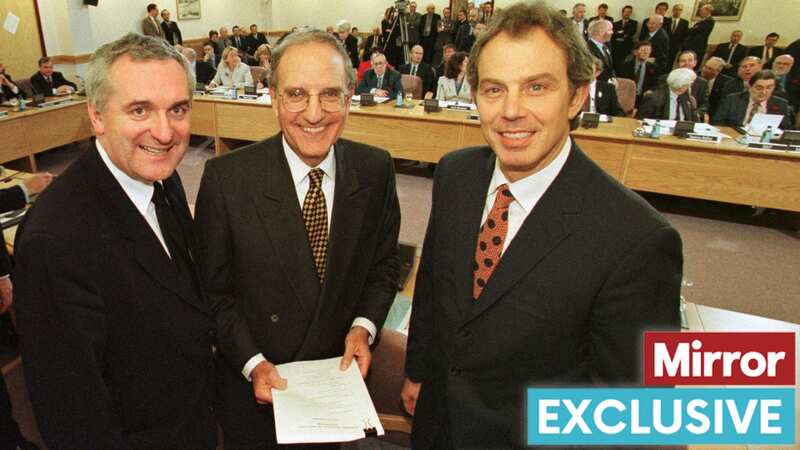 Tony Blair (right) former US Senator George Mitchell (centre) and Bertie Ahern (left), celebrate the signing of the Good Friday Agreement (Image: PA)