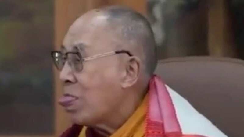 Dalai Lama apologises for asking little boy to 