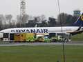 Terror for Ryanair passengers as sparks fly from plane wheel as it lands