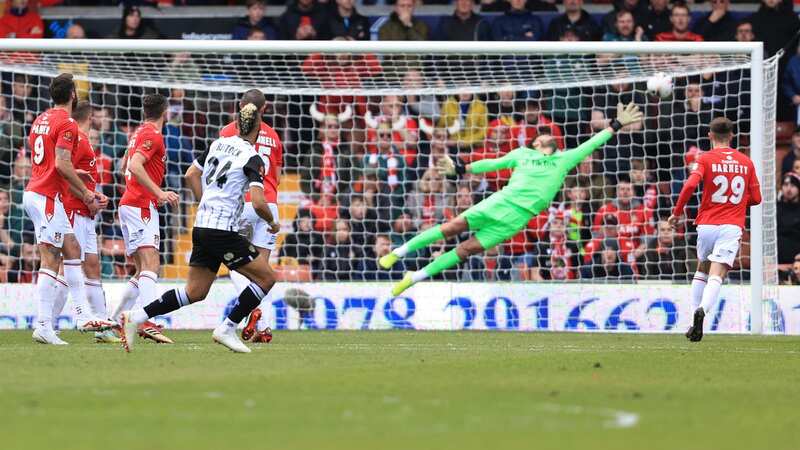 Ben Foster kept out a 96th minute penalty to earn Wrexham a 3-2 win