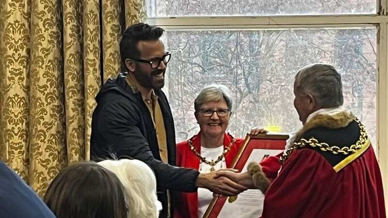Ryan receives the honour from Mayor Brian Cameron