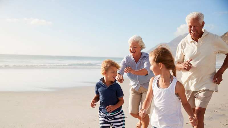 Older people are gifting their families holidays, according to SunLife research (Image: Getty Images/iStockphoto)