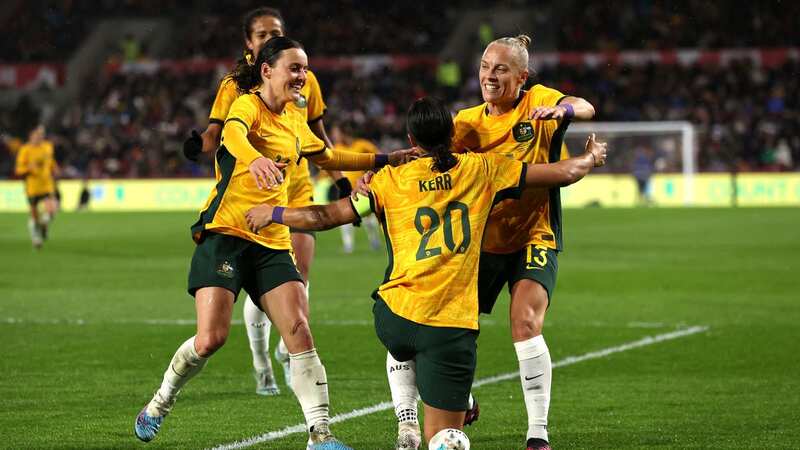 Australia celebrate after their opening goal