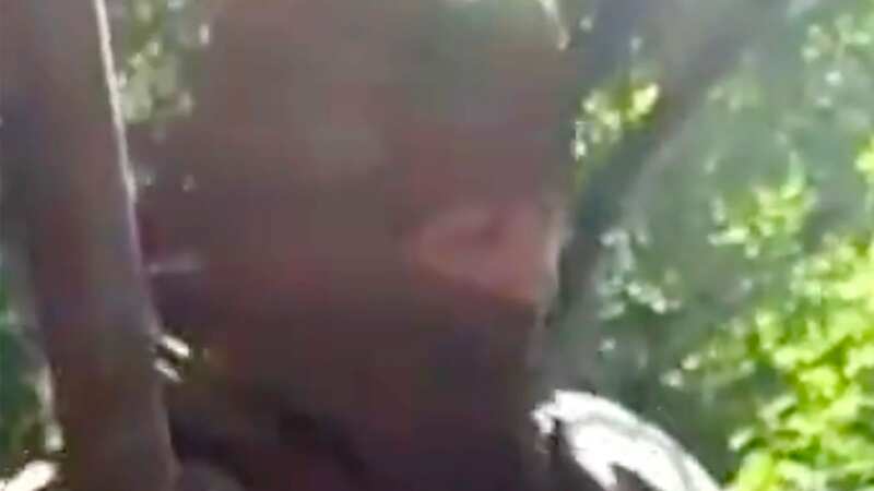 One of the savages who severed off a Ukrainian prisoner