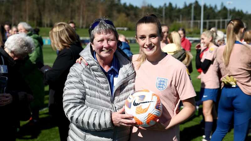 Ella Toone and Pat Mitchell-Firth pose for a photograph during a presentation of legacy caps at St George