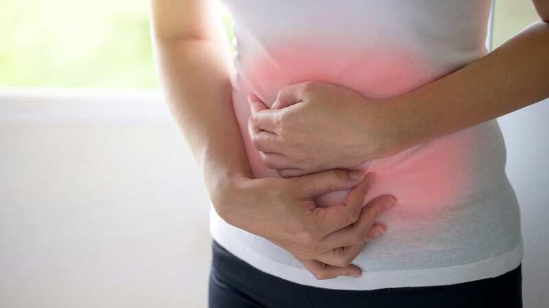 Discomfort or bloating always brought on by eating could be a bowel cancer sign (Image: Getty Images)