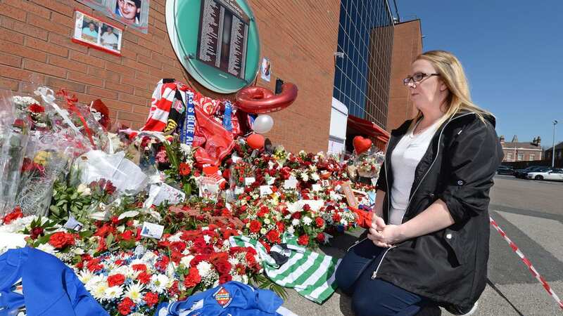 Charlotte Hennessy at the Hillsborough memorial at Anfield (Image: Sunday Mirror)