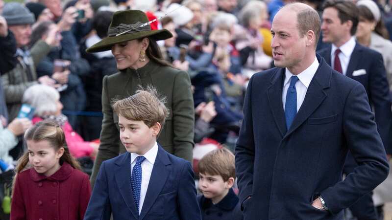 George walking with his family (Image: UK Press via Getty Images)