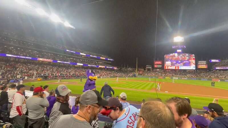 A fan tackled the Colorado Rockies mascot during a game against St Louis Cardinals (Image: @_coco0218 / Twitter)