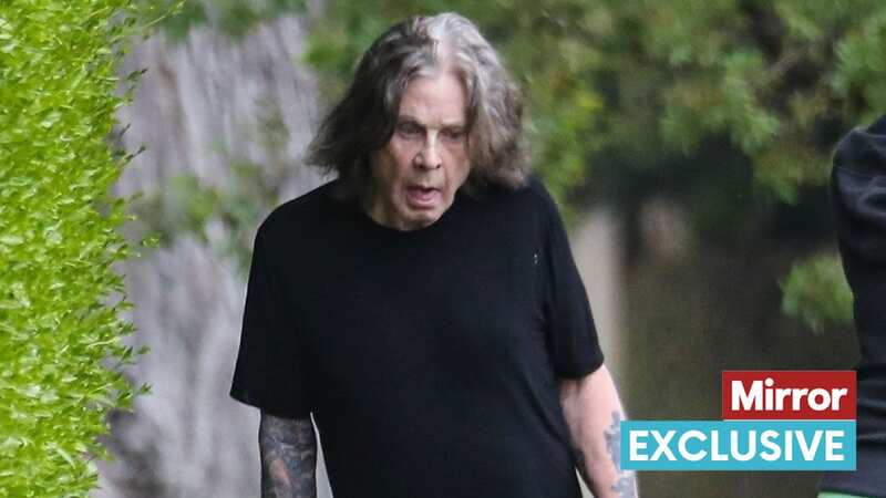 Ozzy Osbourne, 74, pictured walking without cane weeks after cancelling tour