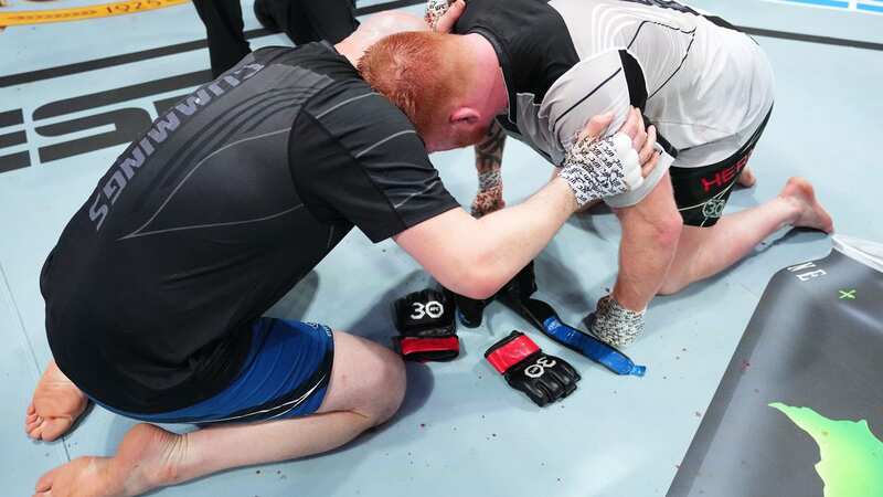 KANSAS CITY, MISSOURI - APRIL 15: (R-L) Zak Cummings punches Ed Herman in a light heavyweight fight during the UFC Fight Night event at T-Mobile Center on April 15, 2023 in Kansas City, Missouri. (Photo by Josh Hedges/Zuffa LLC via Getty Images)
