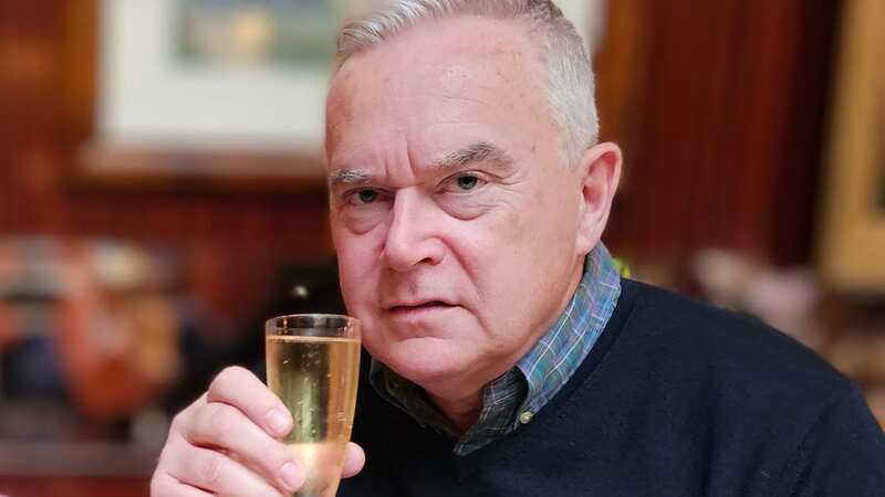 Huw Edwards breaks silence on BBC job cuts with defiant champagne toast
