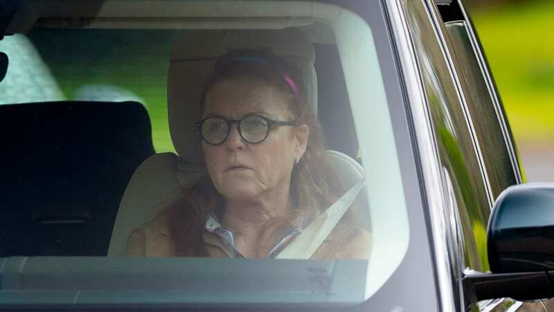 Glum Sarah Ferguson pictured with Andrew after Charles