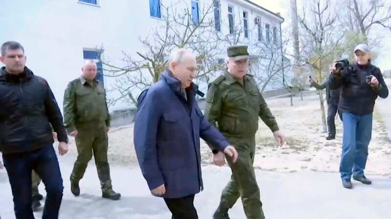 Putin visibly limps as health speculation grows on visit to occupied Ukraine