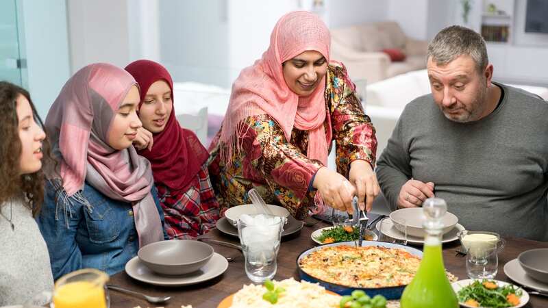 Muslim family waiting for Iftar food in Ramadan (Image: Getty Images)