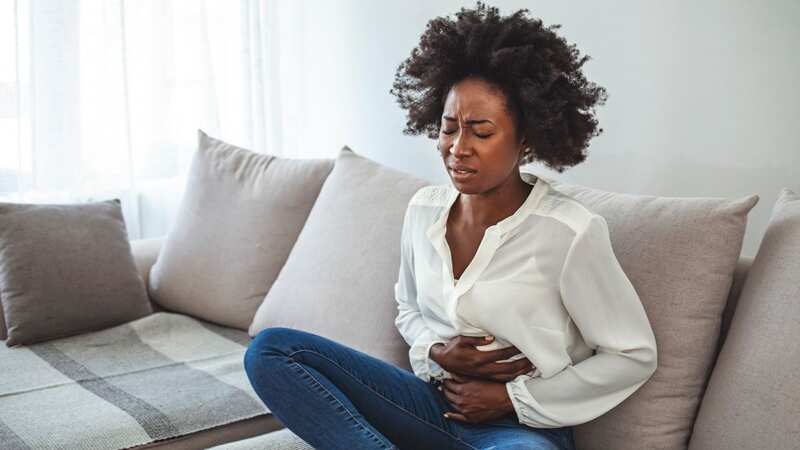 Abdominal pain, cramps and bloating are common symptoms of the condition (Image: Getty Images/iStockphoto)