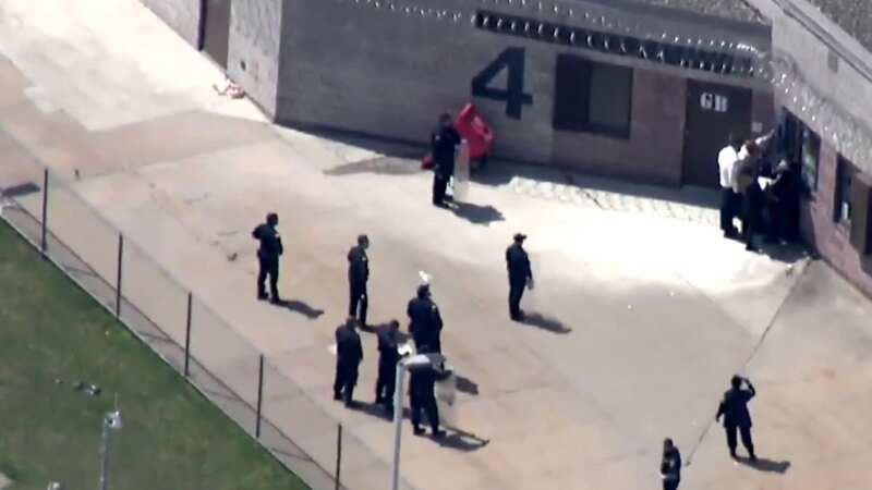 Prison riot sees inmates throw things and block windows before unloading fire extinguisher