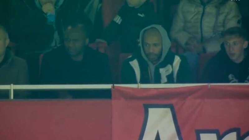 Thierry Henry (right) watches Arsenal
