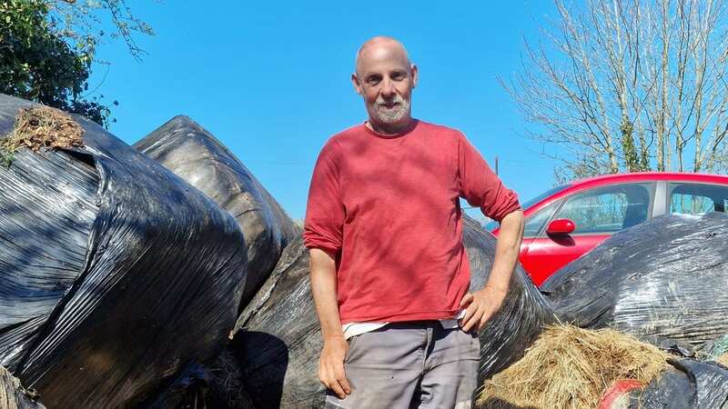 Neil Parker at the site he has taken Adverse Possession of, on the A487 at Tremain, Ceredigion (Image: WalesOnline)